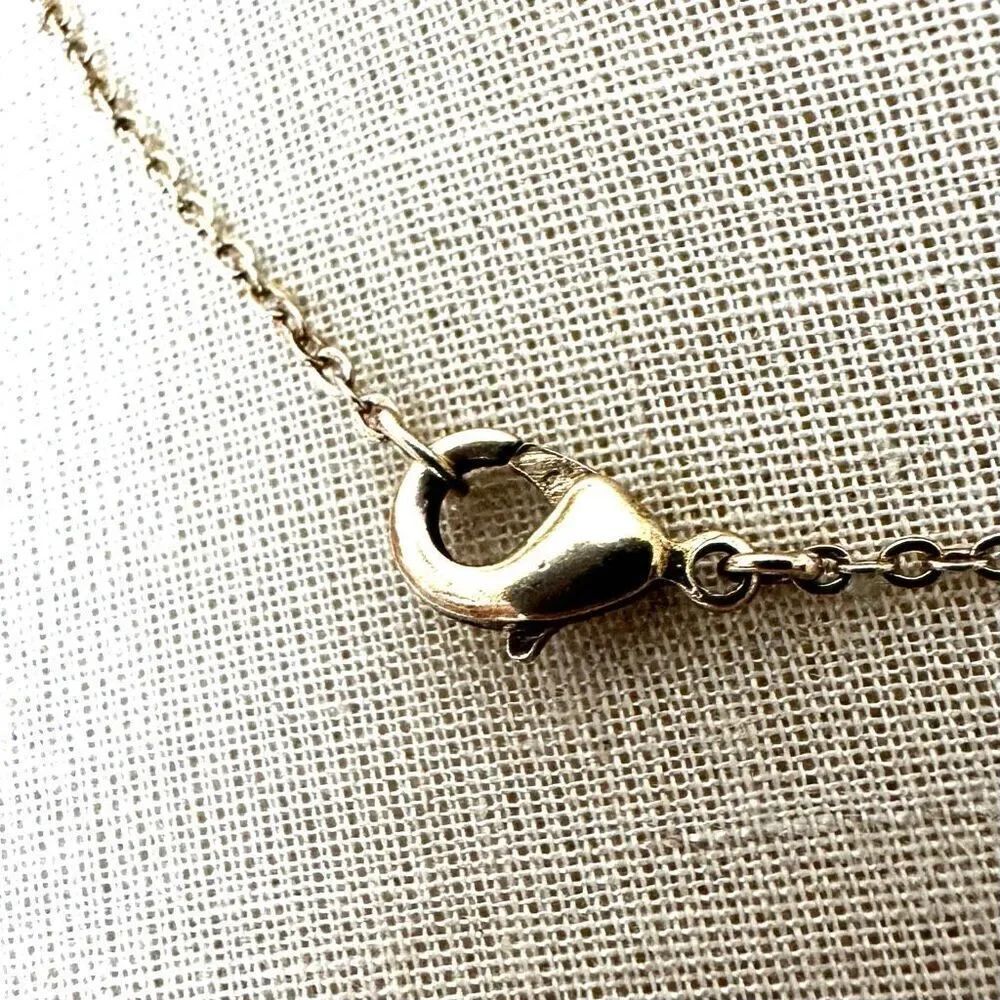 PAJ Silver and gold Tone Textured Bow Pendant Necklace - Picture 5 of 8